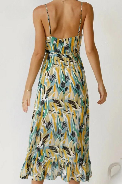 Back of the green Ingrid flowy summer midi dress with adjustable straps