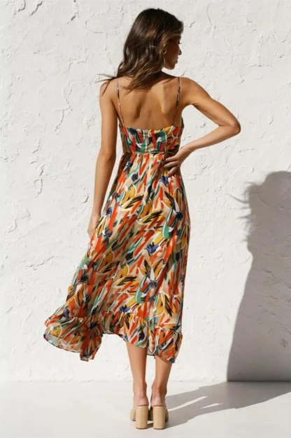 Back view of the orange Ingrid flowy summer midi dress with open back