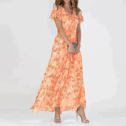 Women's Flutter Sleeve Floral Maxi Dress in Orange floral, front view on model - Katinka