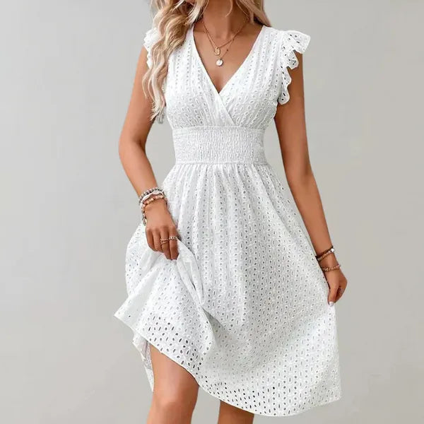 Siri white eyelet midi dress with flutter sleeves and smocked waist, front