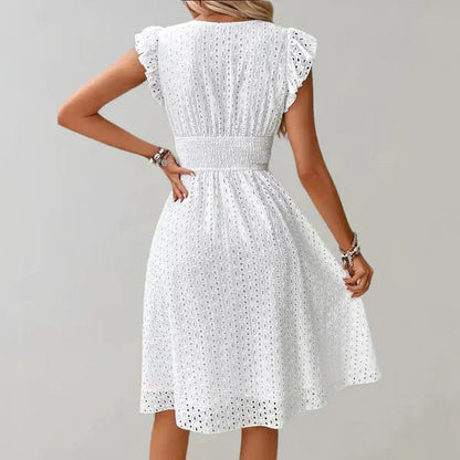 Back view of the white Siri flutter sleeves eyelet midi dress