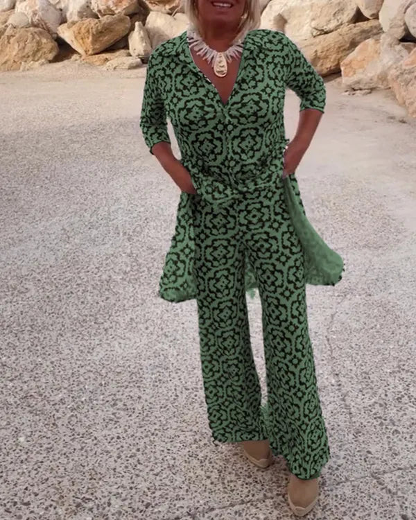 Gavriella green geometric two-piece set, model walking front view outdoors