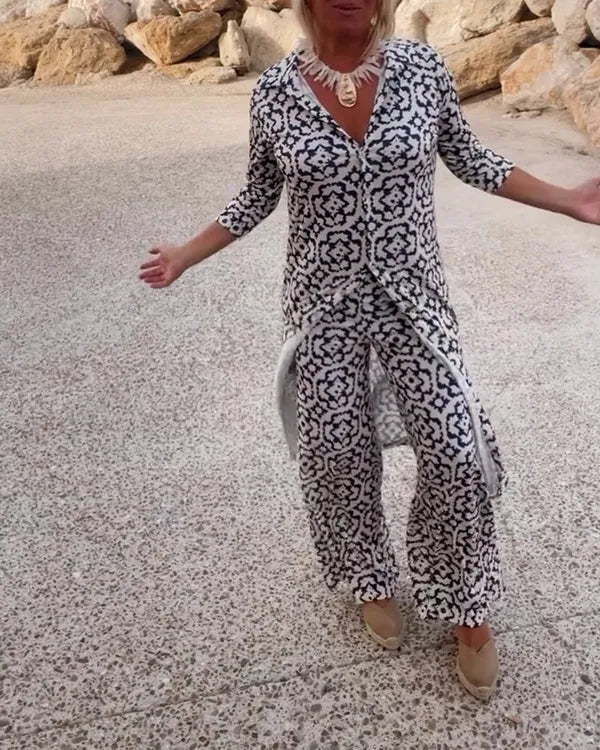 Gavriella geometric print set in white, model walking outdoors front view
