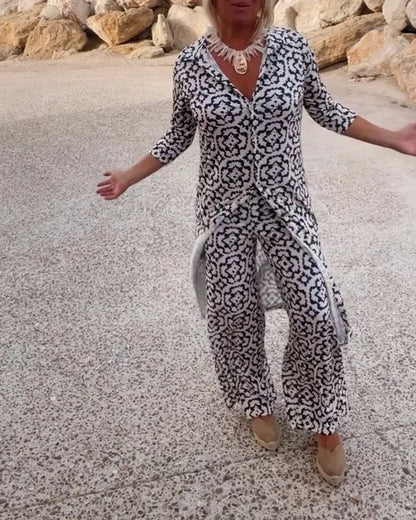 Gavriella geometric print set in white, model walking outdoors front view