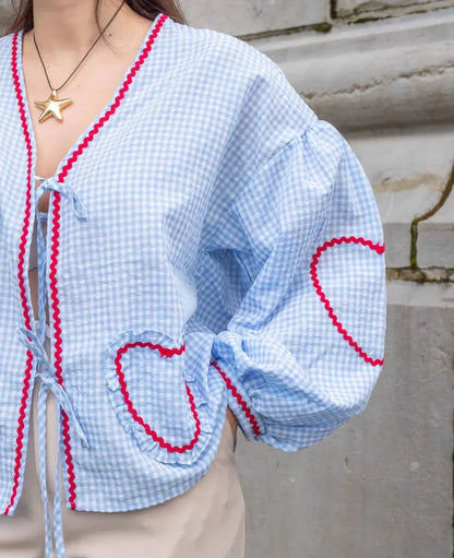 Women's Gingham Heart Print Tie Front Blouse in Light Blue, heart pocket detail – Cressida
