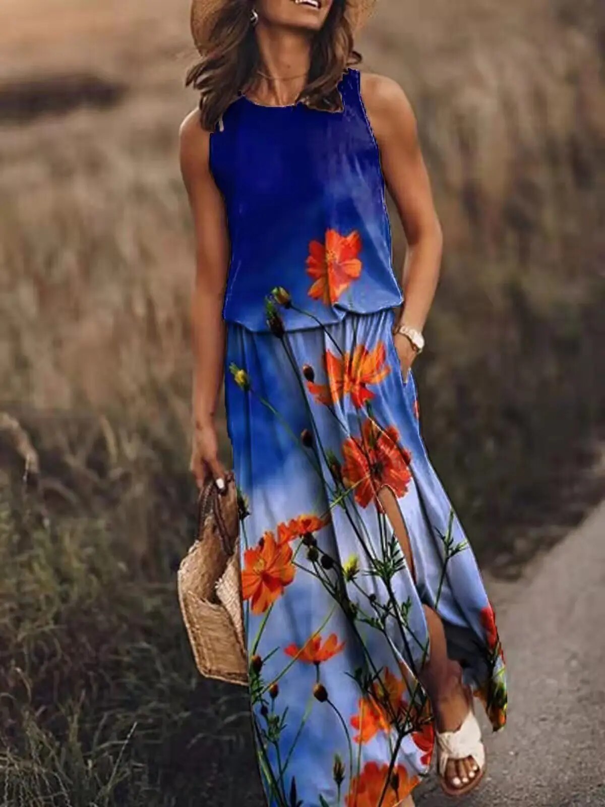 Blue Lucianna sleeveless maxi dress with orange floral graphic print, full front view on model