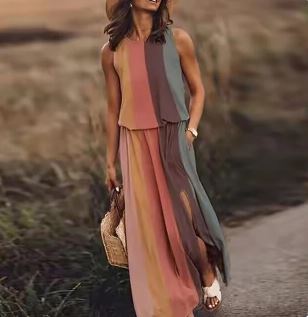 Gray toned striped Lucianna sleeveless maxi dress, front view on model at golden hour