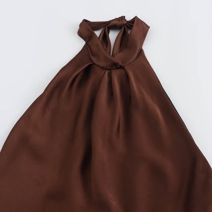 Close-up of the brown satin halter neckline on the Juniper open back maxi dress