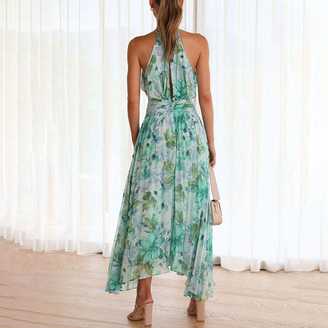 Green Bianca halter pleated maxi dress from behind, open back and pleated skirt