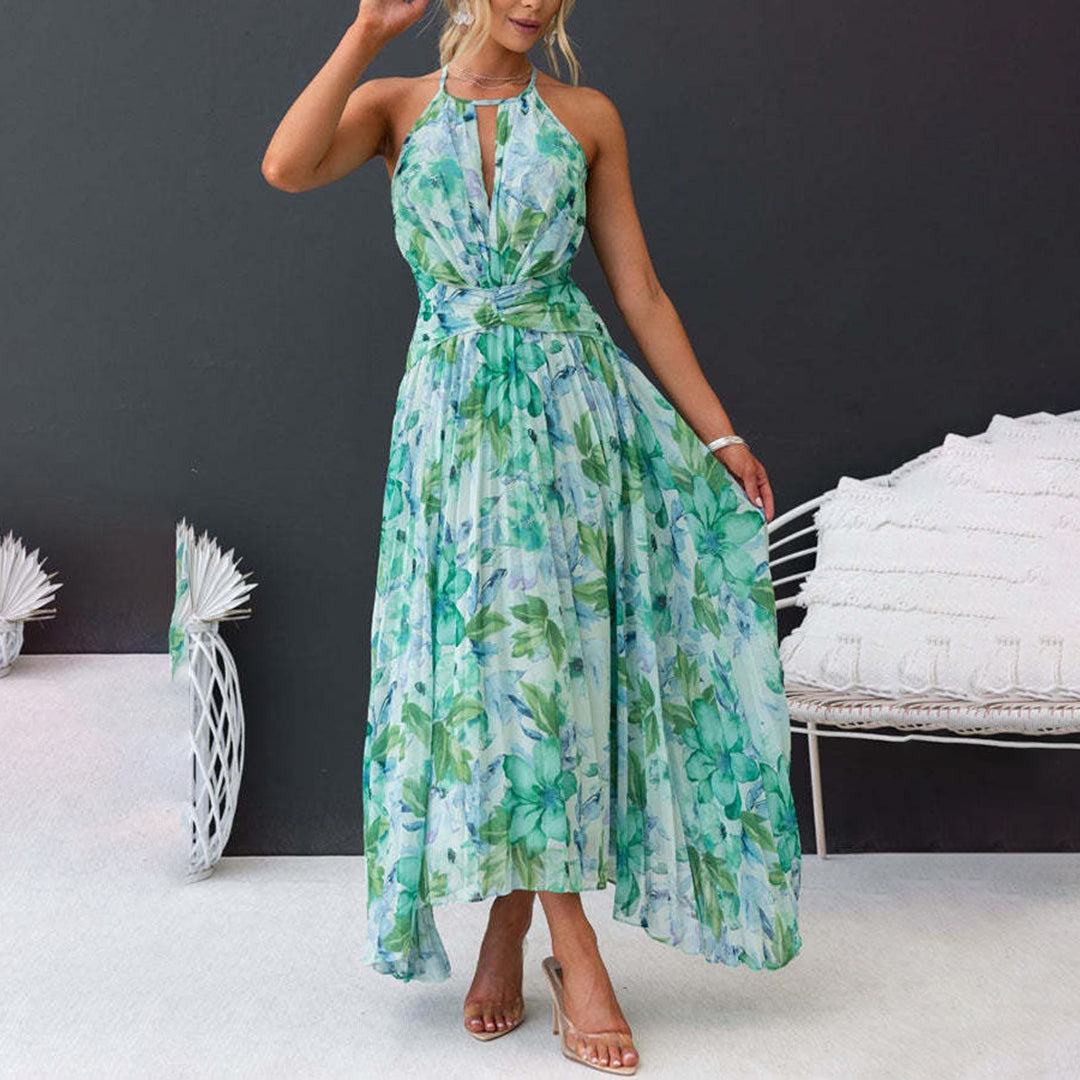 Green Bianca halter pleated maxi dress, front view showing the flowing pleated hem