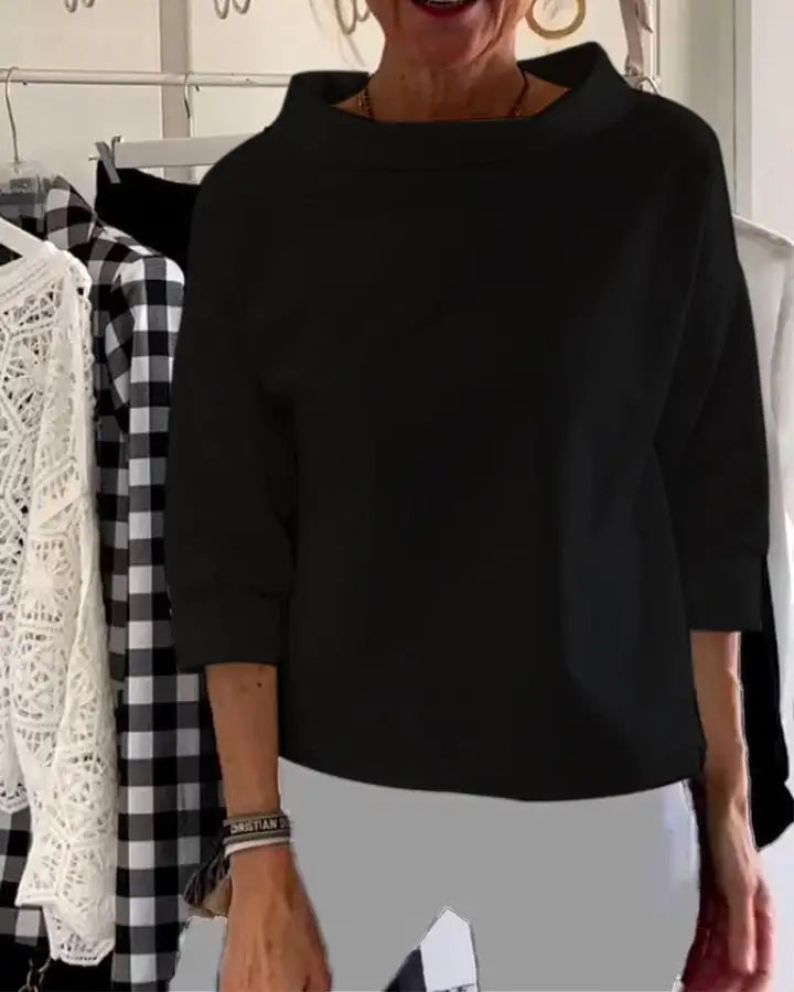 Daciana Women's High Neck 3/4 Sleeve Top in black, front view with 3/4 sleeves