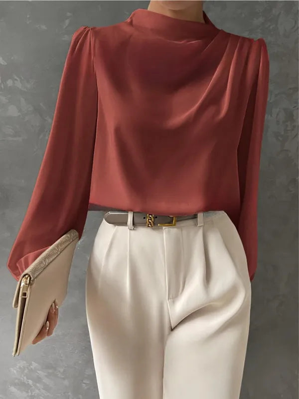 Women's High Neck Long Sleeve Blouse in Coral, front view of the draped neck – Zélie