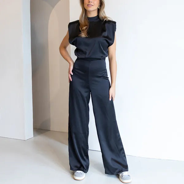 Wenda women's high neck padded shoulder jumpsuit in black, full front view