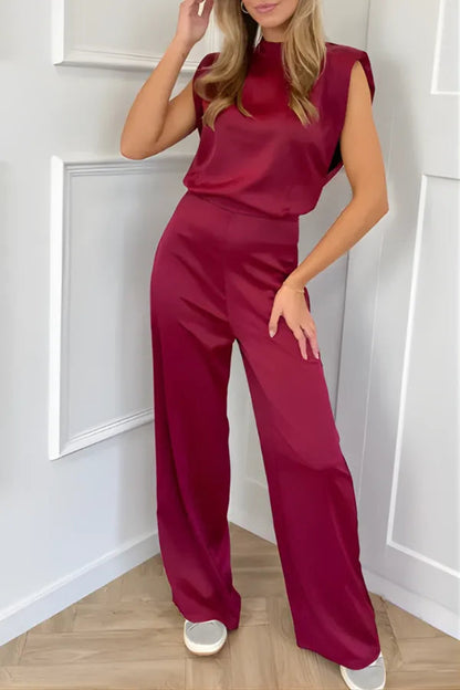 Wine red Wenda women's high neck padded shoulder jumpsuit on model, front view
