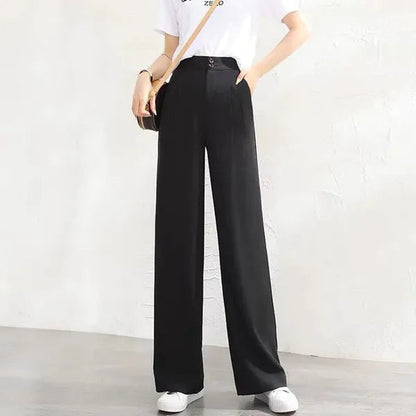 Gabrielle Women's High-Rise Drape Trousers in black, front view on model