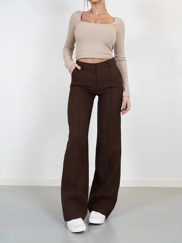 Eloise Women's High-Rise Pintuck Flowy Trousers in brown, front view on model