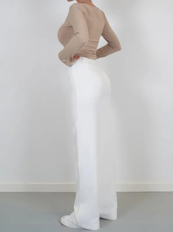 Eloise Women's High-Rise Pintuck Flowy Trousers in white, side back view on model