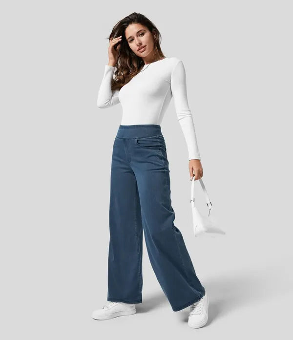 Gineva Women's High-Rise Flare Denim Pants in dark blue styled with white top and bag
