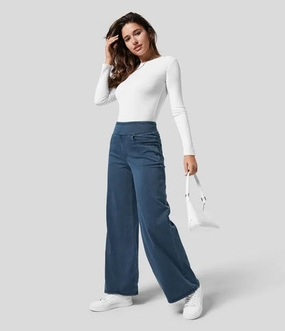 Gineva Women's High-Rise Flare Denim Pants in dark blue styled with white top and bag