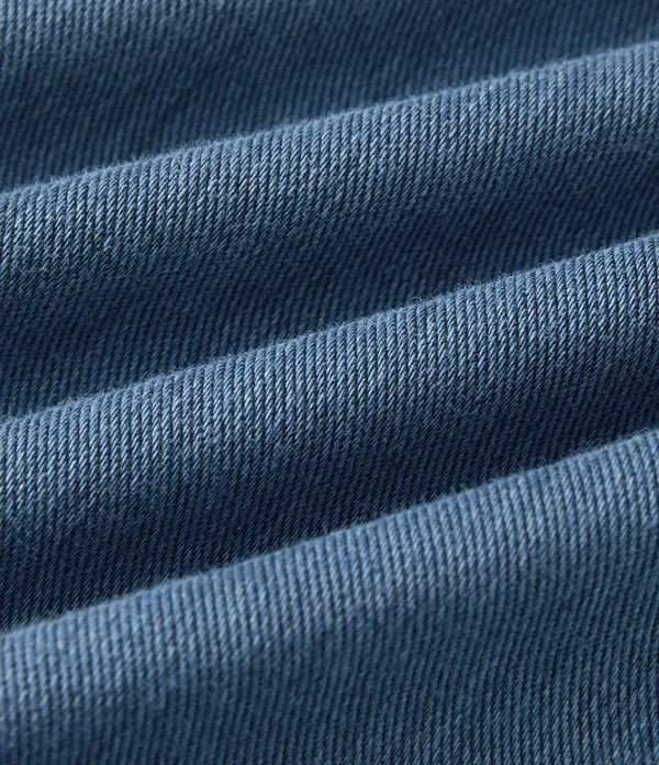 Gineva Women's High-Rise Flare Denim Pants dark blue denim fabric texture close-up