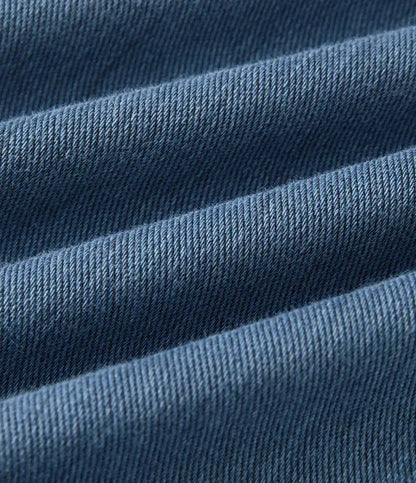 Gineva Women's High-Rise Flare Denim Pants dark blue denim fabric texture close-up
