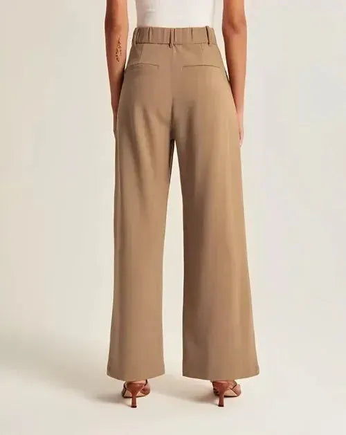 Alessia Women's High-Waist Pleated Wide-Leg Pants in khaki, back view with welt pockets