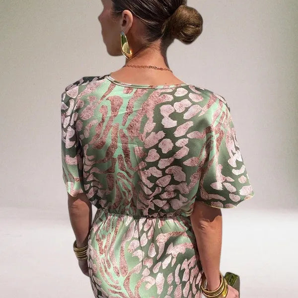 Back view of the Heather knot front midi dress in multicolor print