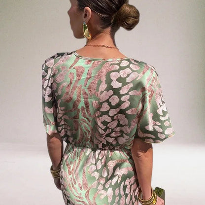 Back view of the Heather knot front midi dress in multicolor print