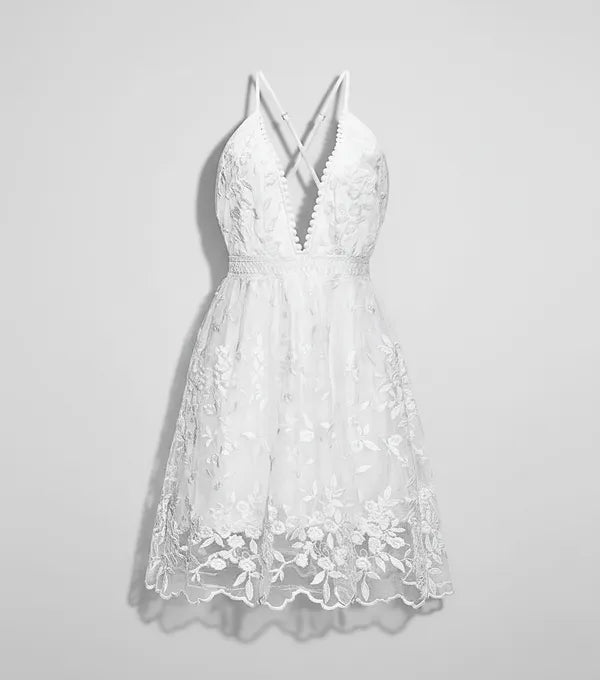 Elsie women's lace mini summer dress in white, flat lay product view on gray