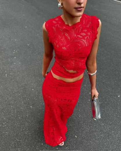 Sabela red lace top and maxi skirt set, outdoor front view on model walking