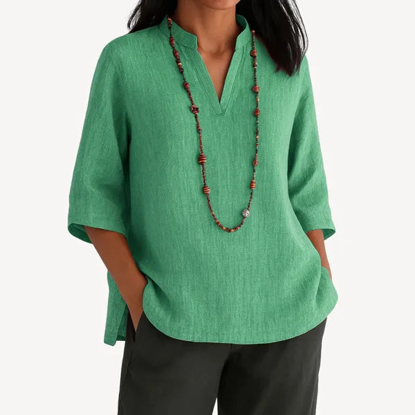 Women's Linen 3/4 Sleeve V Neck Blouse in Green, front view with dark trousers – Yvaine