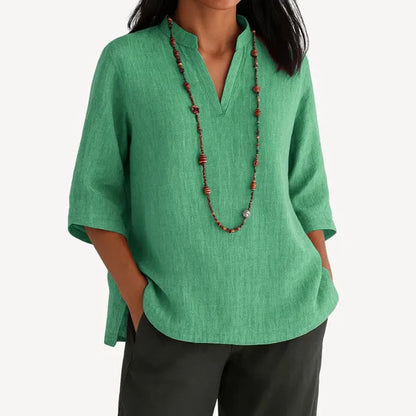 Women's Linen 3/4 Sleeve V Neck Blouse in Green, front view with dark trousers – Yvaine