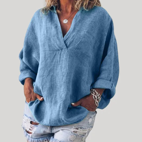 Women's Linen Long Sleeve Blouse in Blue, front view of the deep V neckline – Solène