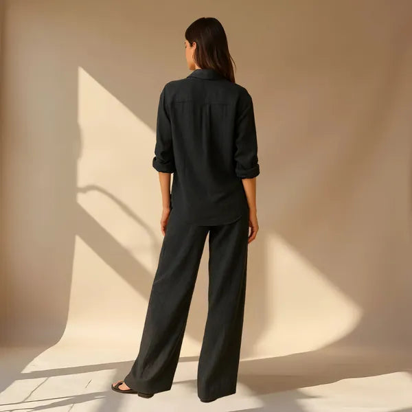 Hedda black linen shirt and wide leg trousers set, back view on model