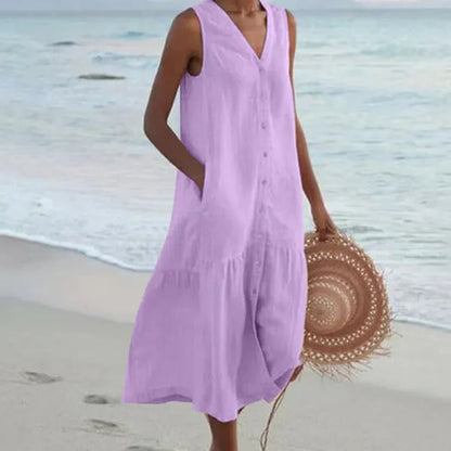Giovanna linen sleeveless midi shirt dress in purple, beach front view
