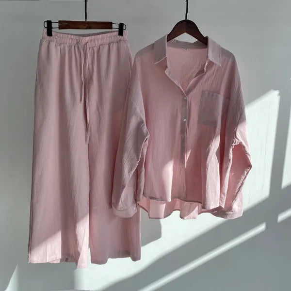 Floriana pink linen shirt and wide leg trousers set displayed on hangers