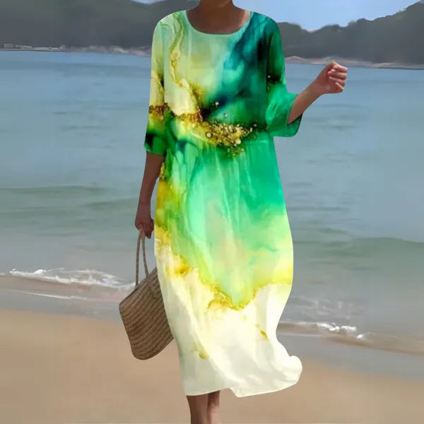 Dark green Kallie caftan maxi dress in vivid watercolour print, front view on model