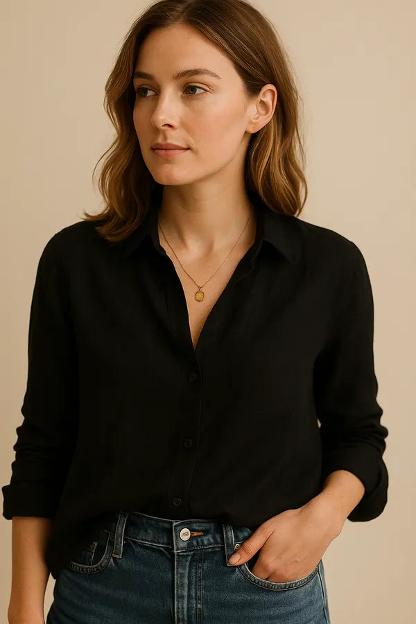 Eliska women's linen blouse in black, relaxed front view on model with jeans
