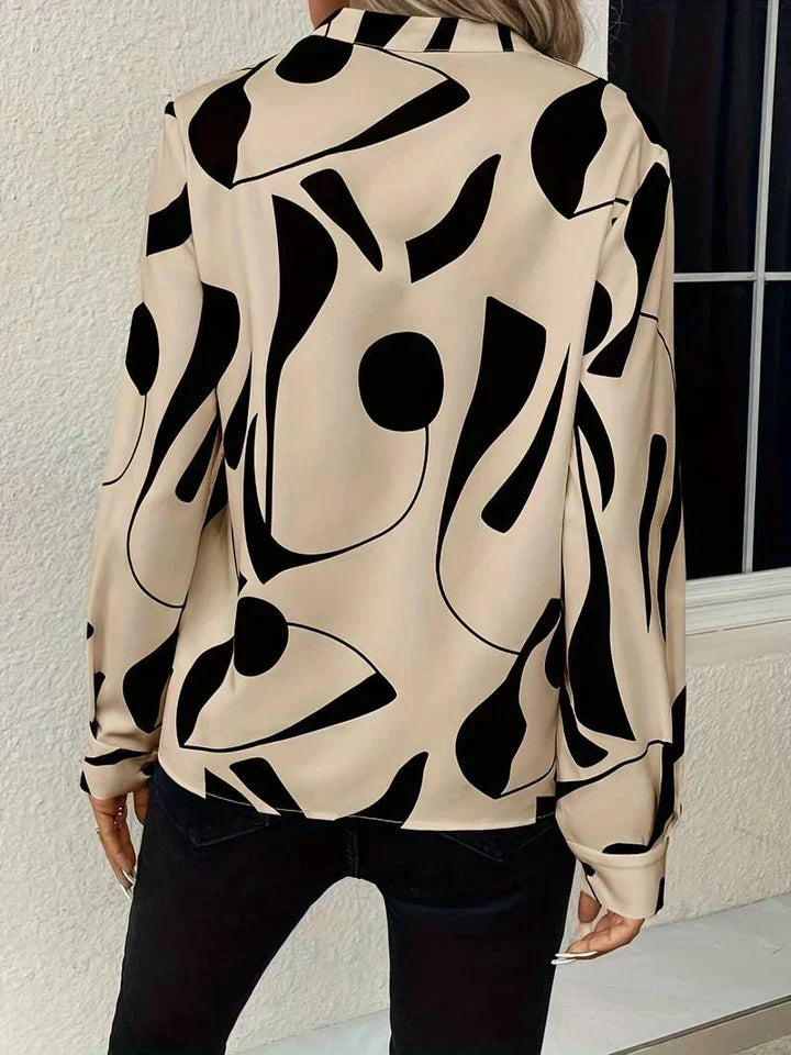 Women's Long Sleeve Print Blouse in Beige, back view of the abstract print – Linnea