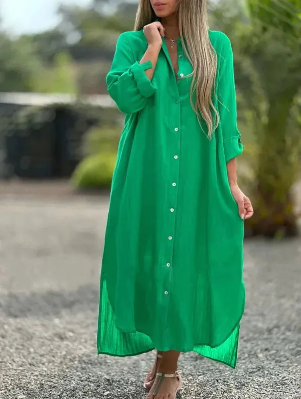 Dark green Camilla long sleeve shirt maxi dress, front view of the flowing hem