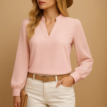 Arlena Women's Long Sleeve V-Neck Top in pink, front view with textured chevron sleeves