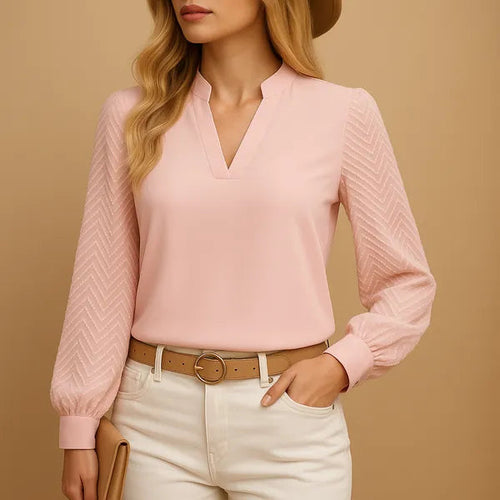 Arlena Women's Long Sleeve V-Neck Top in pink, front view with textured chevron sleeves