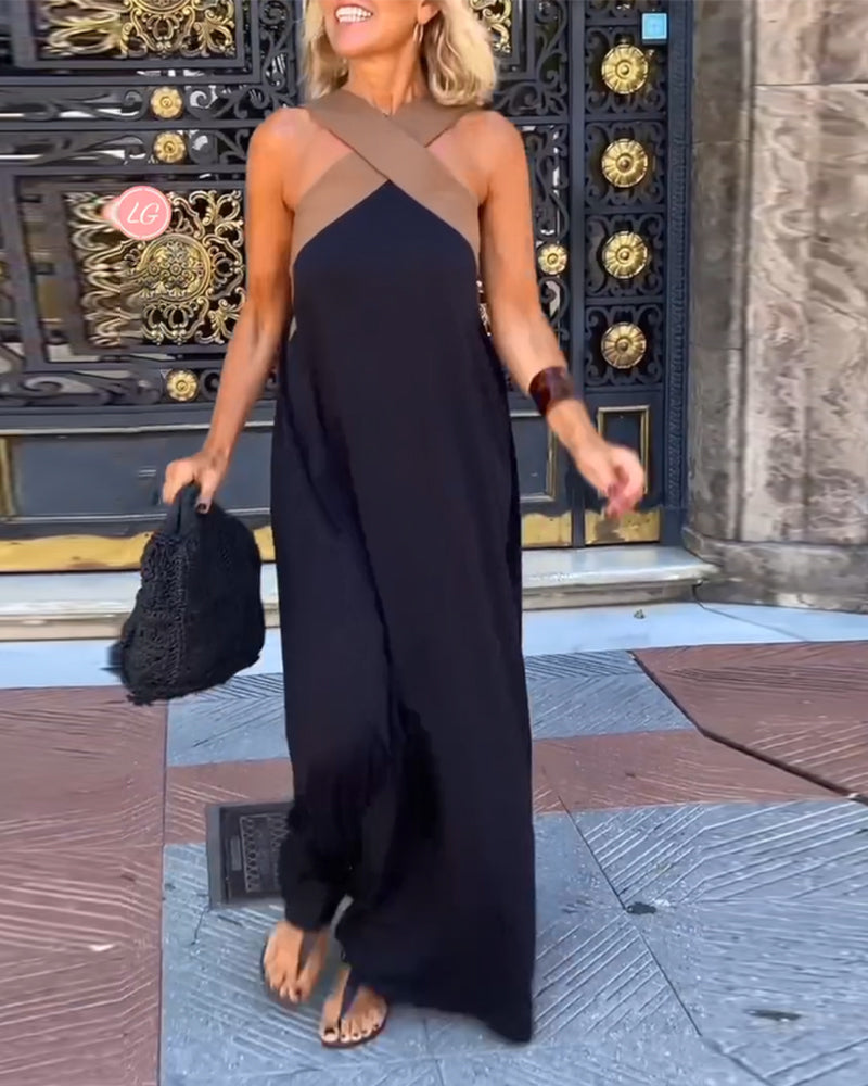 Black Hadrienne loose halter maxi dress, full front view of the relaxed silhouette