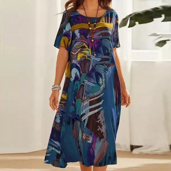 Blue Women's Mid-Calf Short Sleeve Midi Dress - Emmanuelle, abstract print, front view on model