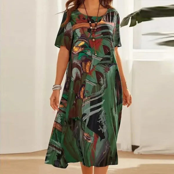 Green Women's Mid-Calf Short Sleeve Midi Dress - Emmanuelle, abstract print, front view on model