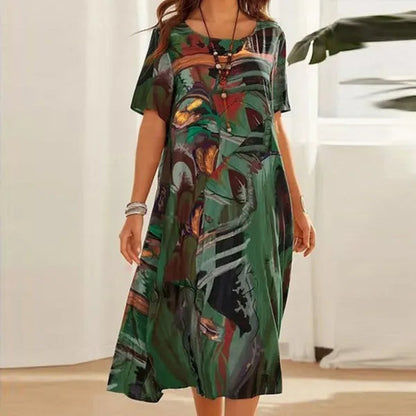 Green Women's Mid-Calf Short Sleeve Midi Dress - Emmanuelle, abstract print, front view on model