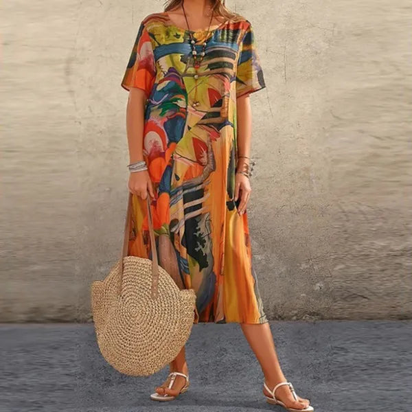 Orange Women's Mid-Calf Short Sleeve Midi Dress - Emmanuelle, abstract print worn with straw bag