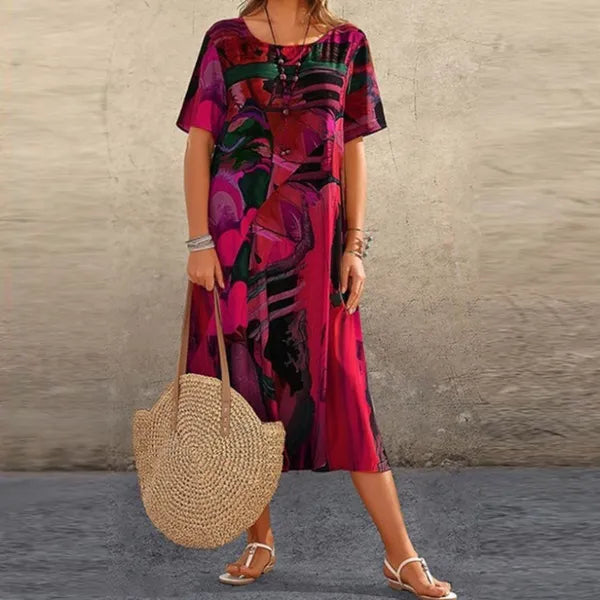 Red Women's Mid-Calf Short Sleeve Midi Dress - Emmanuelle, abstract print worn with straw bag