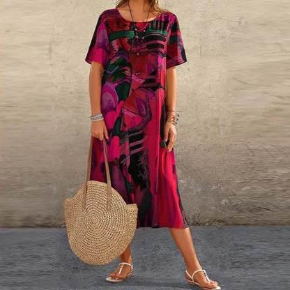Red Women's Mid-Calf Short Sleeve Midi Dress - Emmanuelle, abstract print worn with straw bag