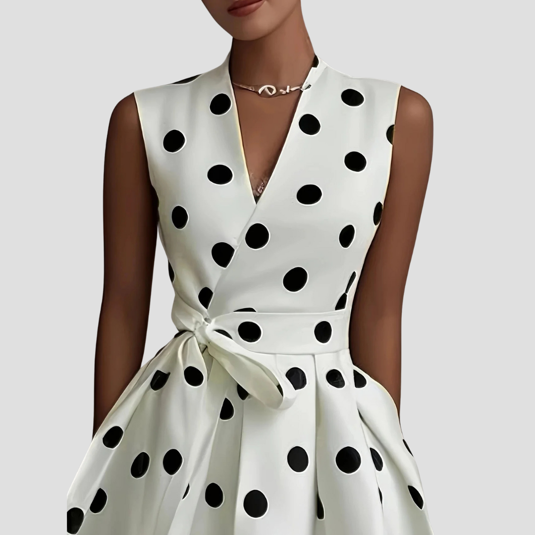 White Women's Midi Dress - Clarie, close-up of black polka dot bodice and wrap tie waist